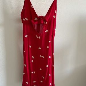 Red dress with flower print. Peakaboo tie